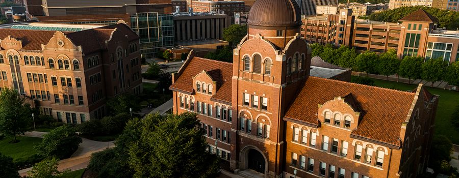 Buildings on the Lake Shore Campus reflect the early morning light.