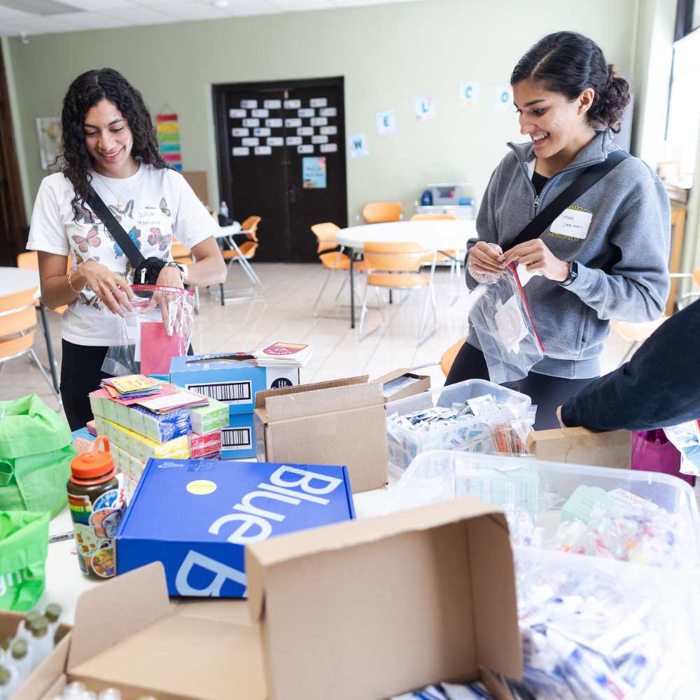 Loyola Chicago students packing kits for Loyola Street Medicine.