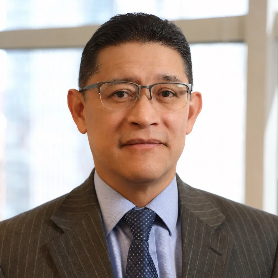 Ric Estrada (BS '89) accept the 2026 Spirit of Loyola Award.