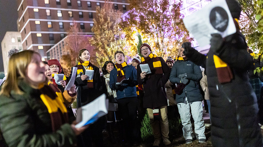 After the Tree Lighting Celebration on St Ignatius Plaza, Loyola students sang carols.
