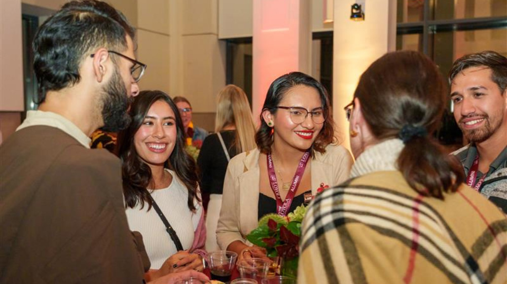 Alumni from the Class of 2010 mingle