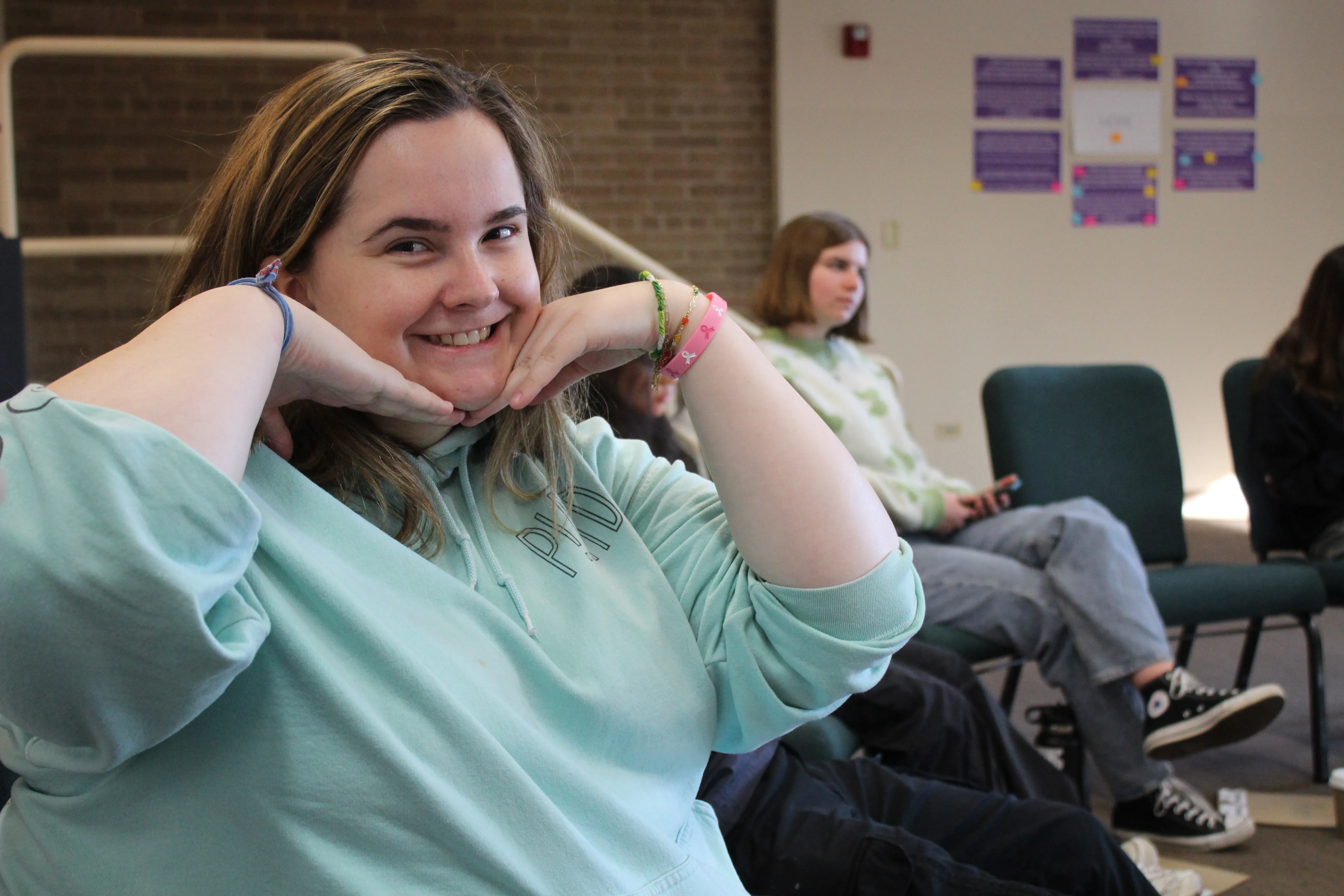 Abby smiling at the camera