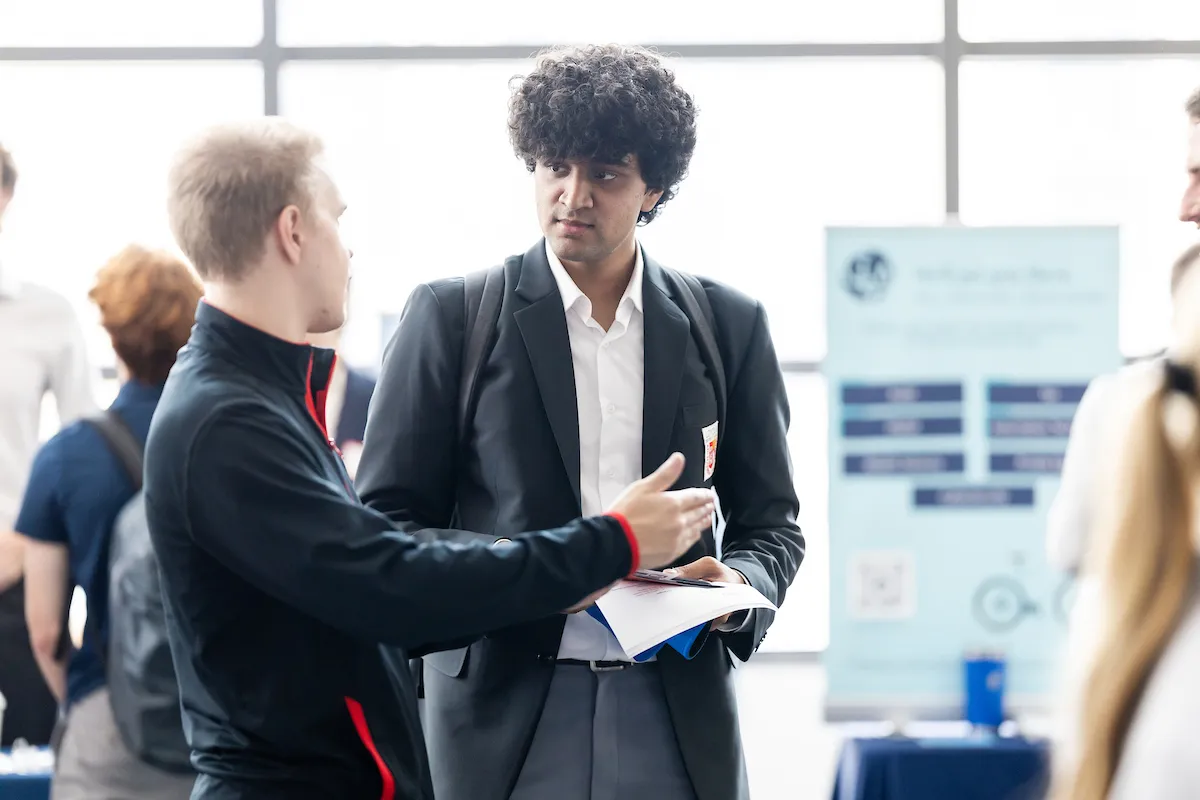 Loyola University Chicago students networking at Supply Chain Career Fair at Schreiber Center