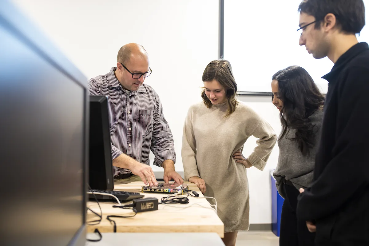 Students and employers discussing business plan Students and employers discussing business plan