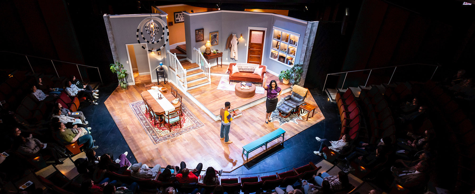 Actors on stage viewed from top row