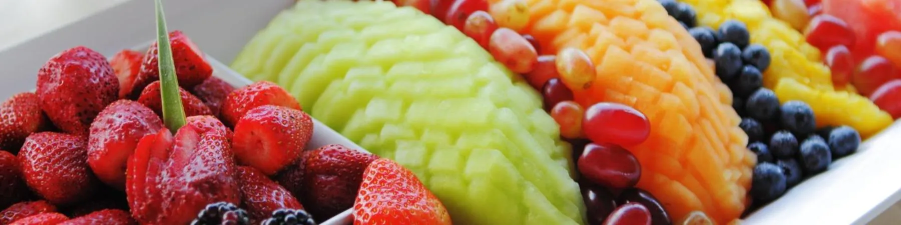 Cut fruit artistically displayed on a platter