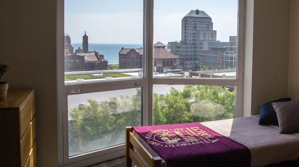 Loyola University Chicago intern housing room in Fordham Hall overlooking Lake Michigan