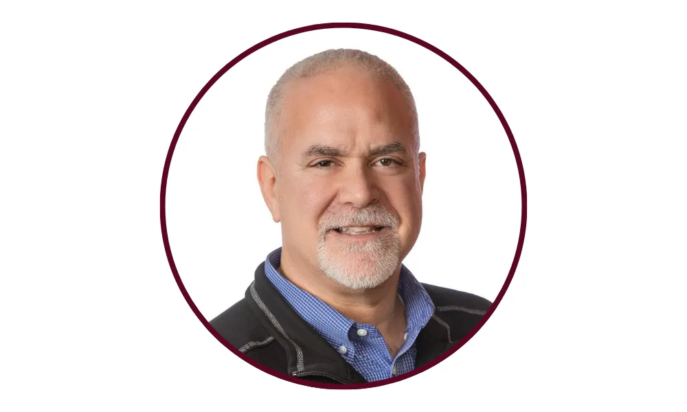 Michael Lubelfeld close up in dress shirt and quarter zip. Michael Lubelfeld close up in dress shirt and quarter zip.