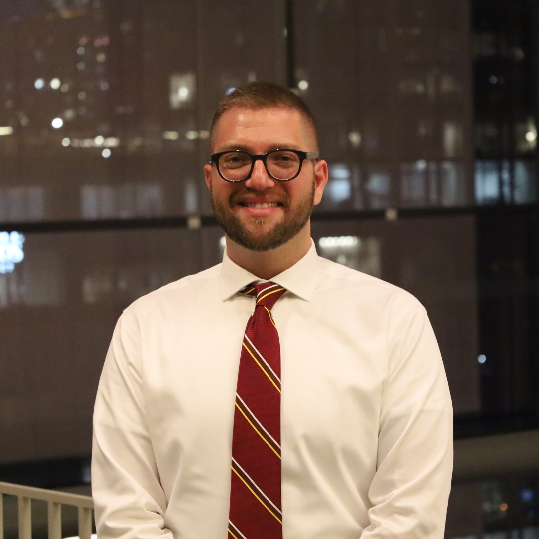 Cody Pullium receiving the 2025 Excellence Award.