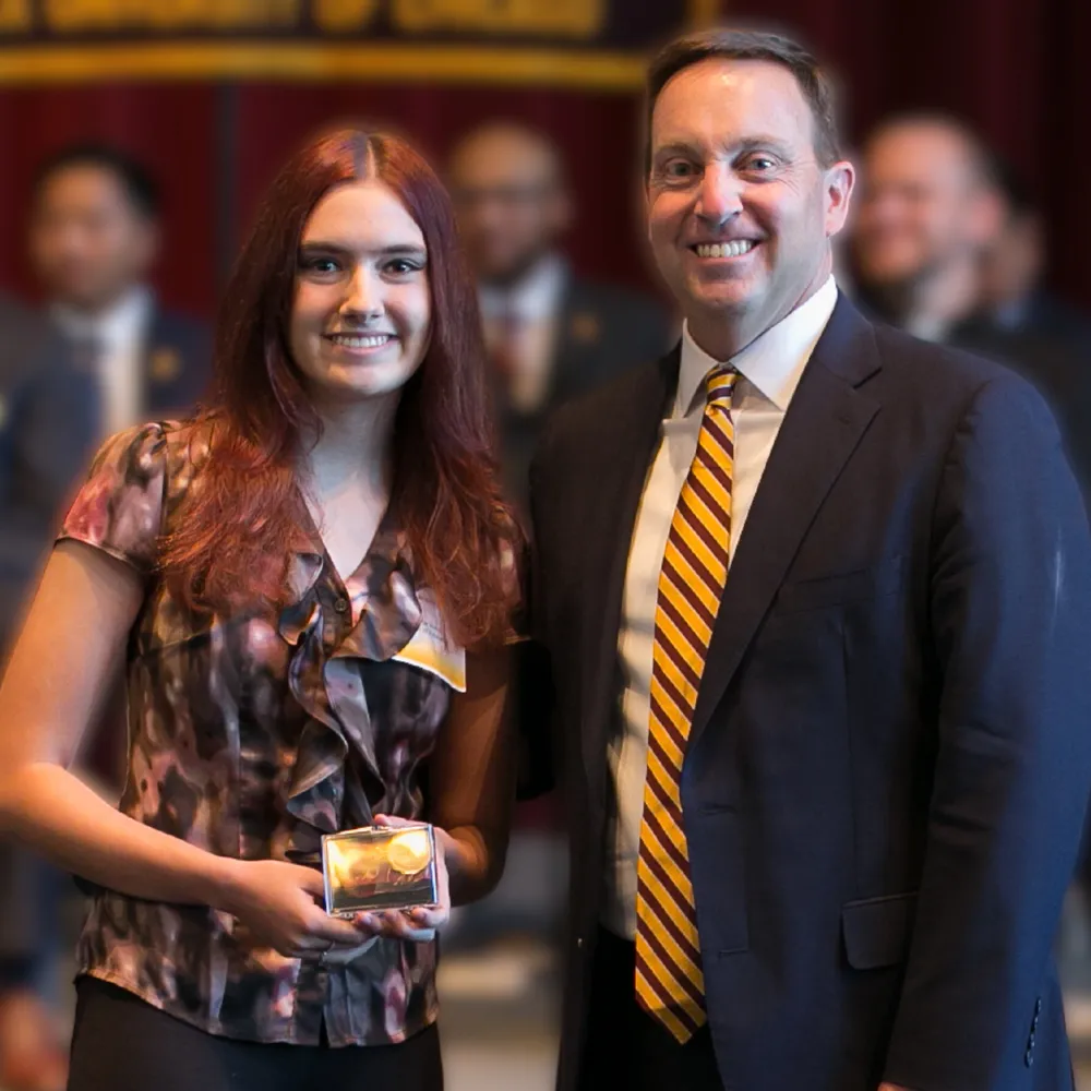 Loyola Chicago student Skylar Baker is inducted into Alpha Sigma Nu.