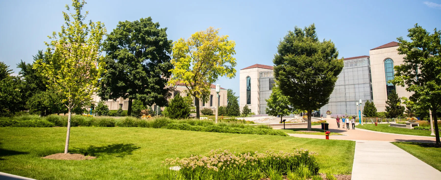 A student takes notes in the classroom.