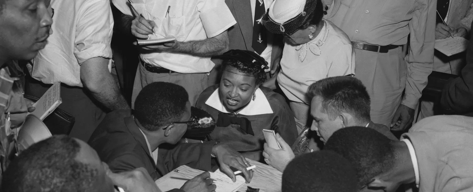 Mamie Till-Mobley talking with a group of reporters. Mamie Till-Mobley talking with a group of reporters.