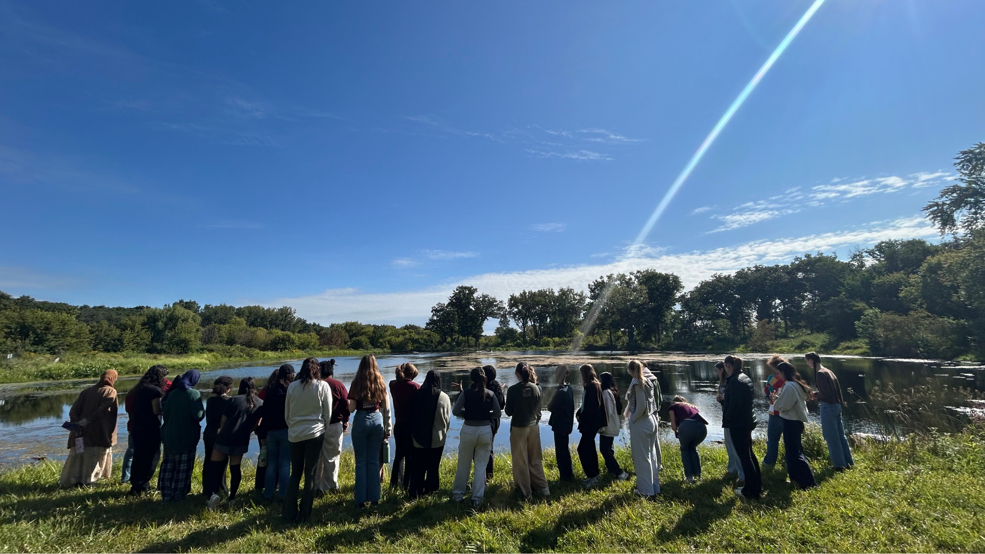 Gannon Scholars stand around a pond at LUREC Gannon Scholars stand around a pond at LUREC
