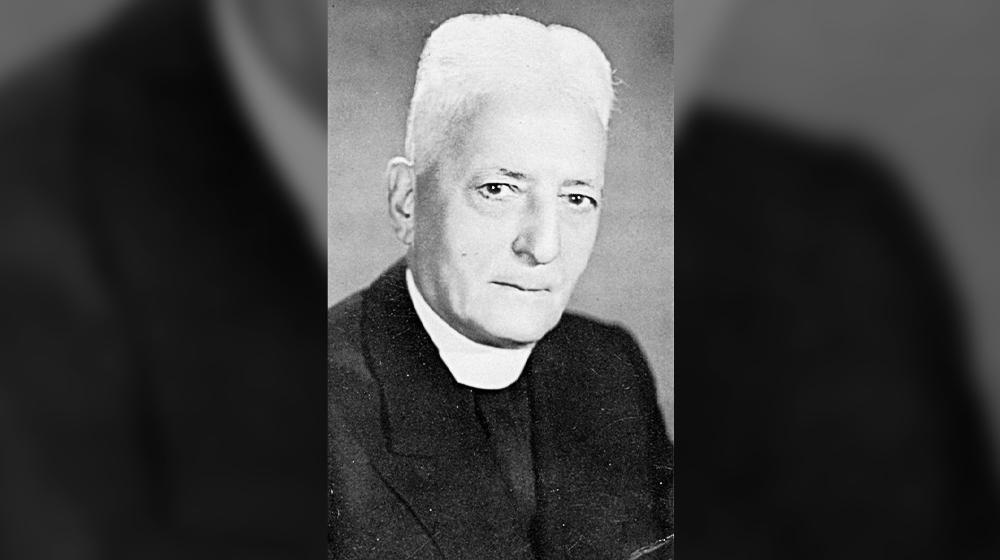 Father Austin G. Schmidt, S.J., served as the first Dean of the Graduate School.