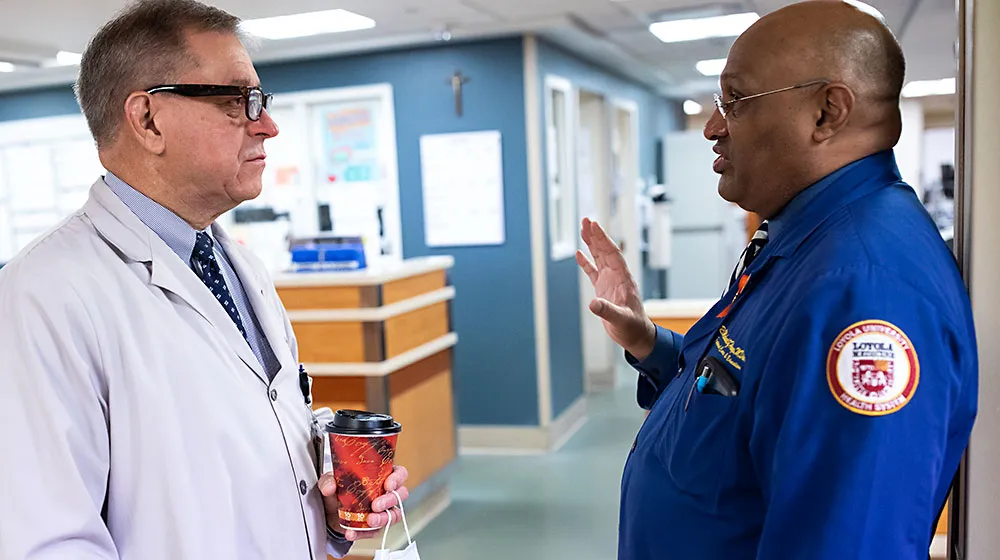 Chaplain Michael Hayes and Mark Cichon, D.O., of Loyola University Chicago together in a conversation.