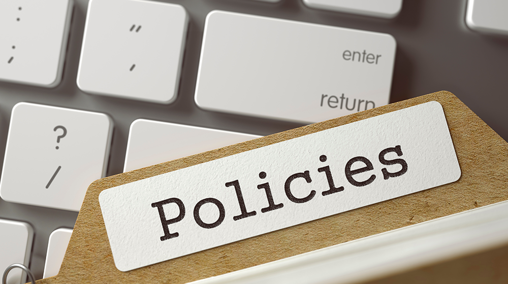 A file folder with a white label displaying the text 