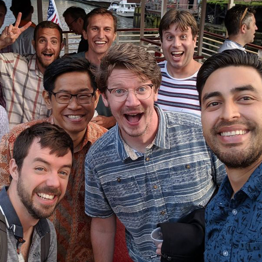 A group of Jesuit First Year members enjoy an event on the Chicago River.