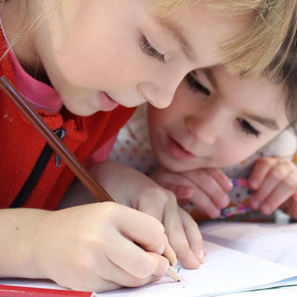 two children working on homework
