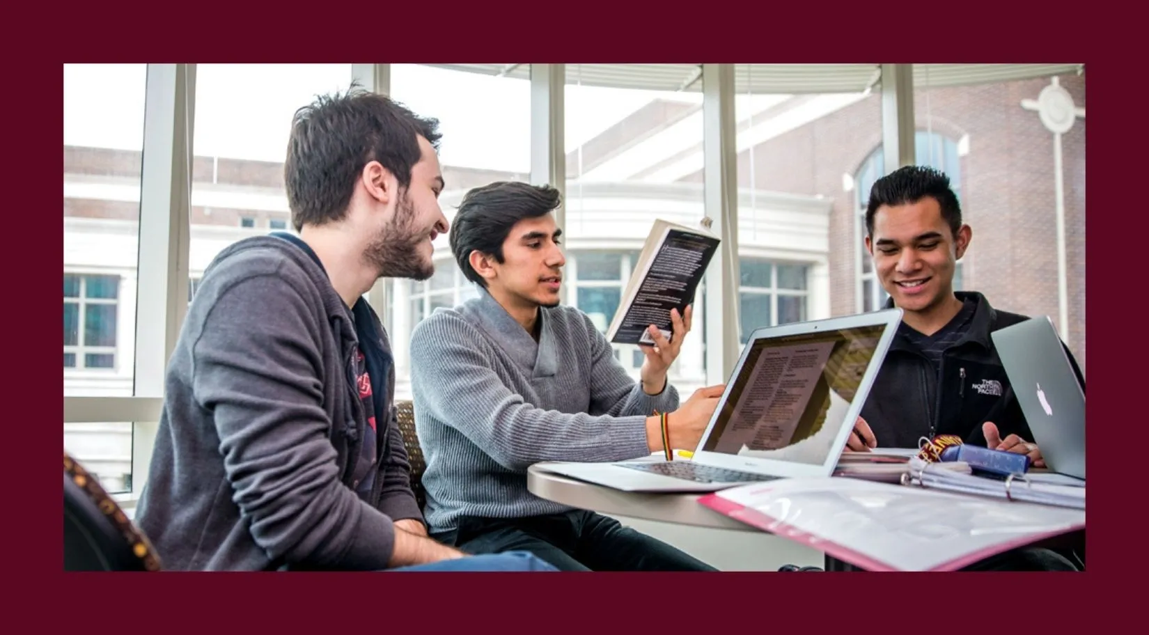 A group of students studying inside. 
