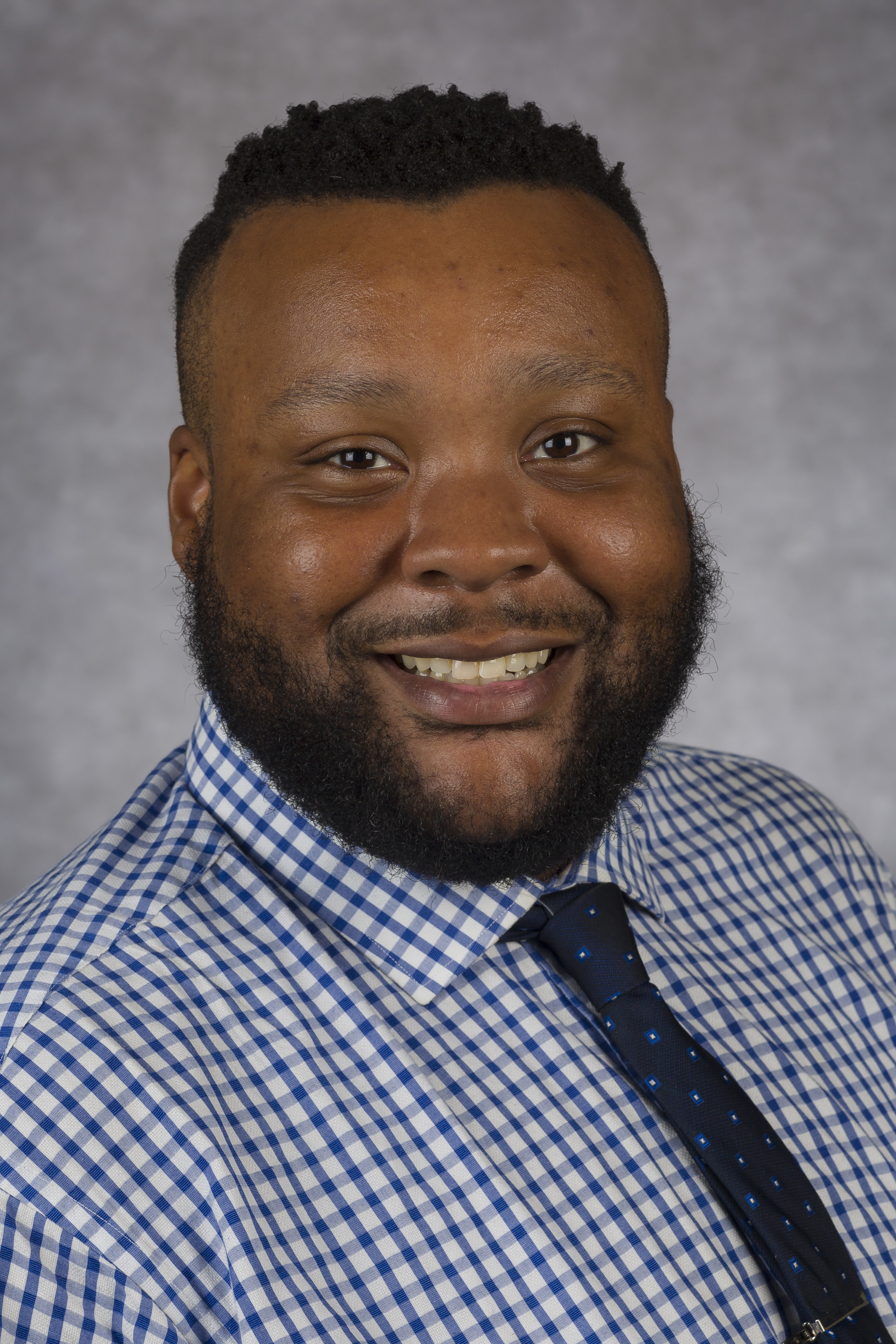 A headshot of James Thomas, M.S.Ed.