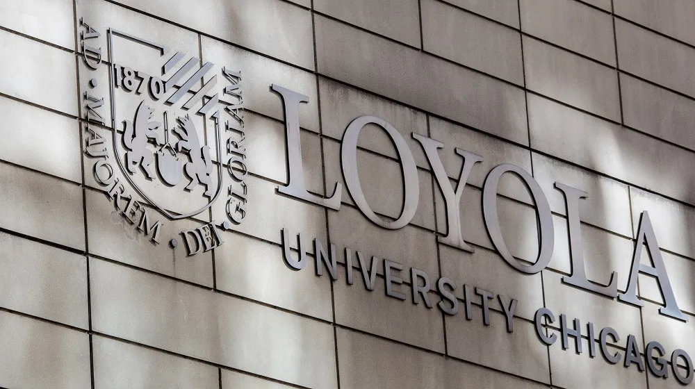 Loyola University Chicago sign on the side of a building Loyola University Chicago sign on the side of a building