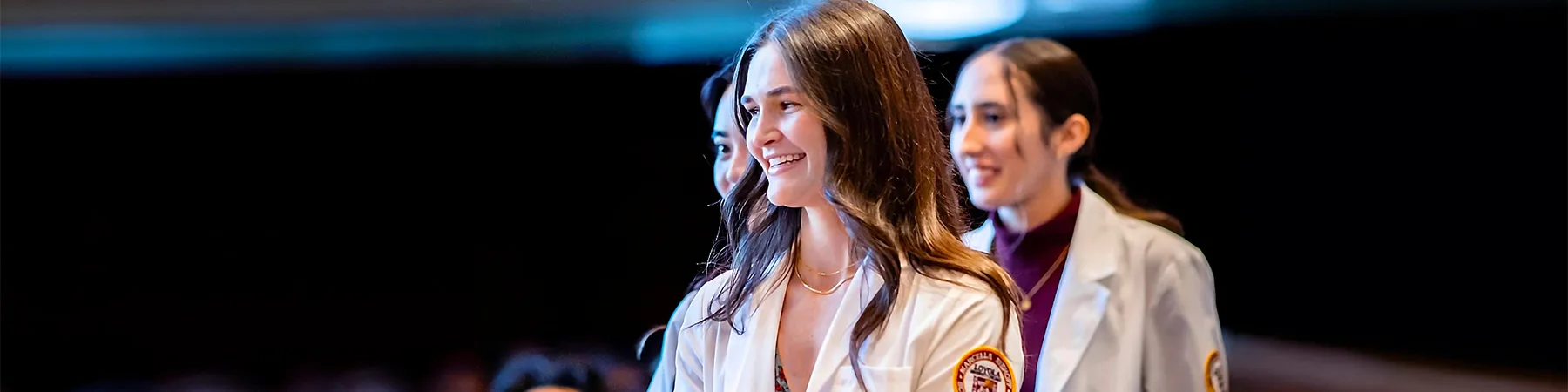 Loyola nursing students at a ceremony