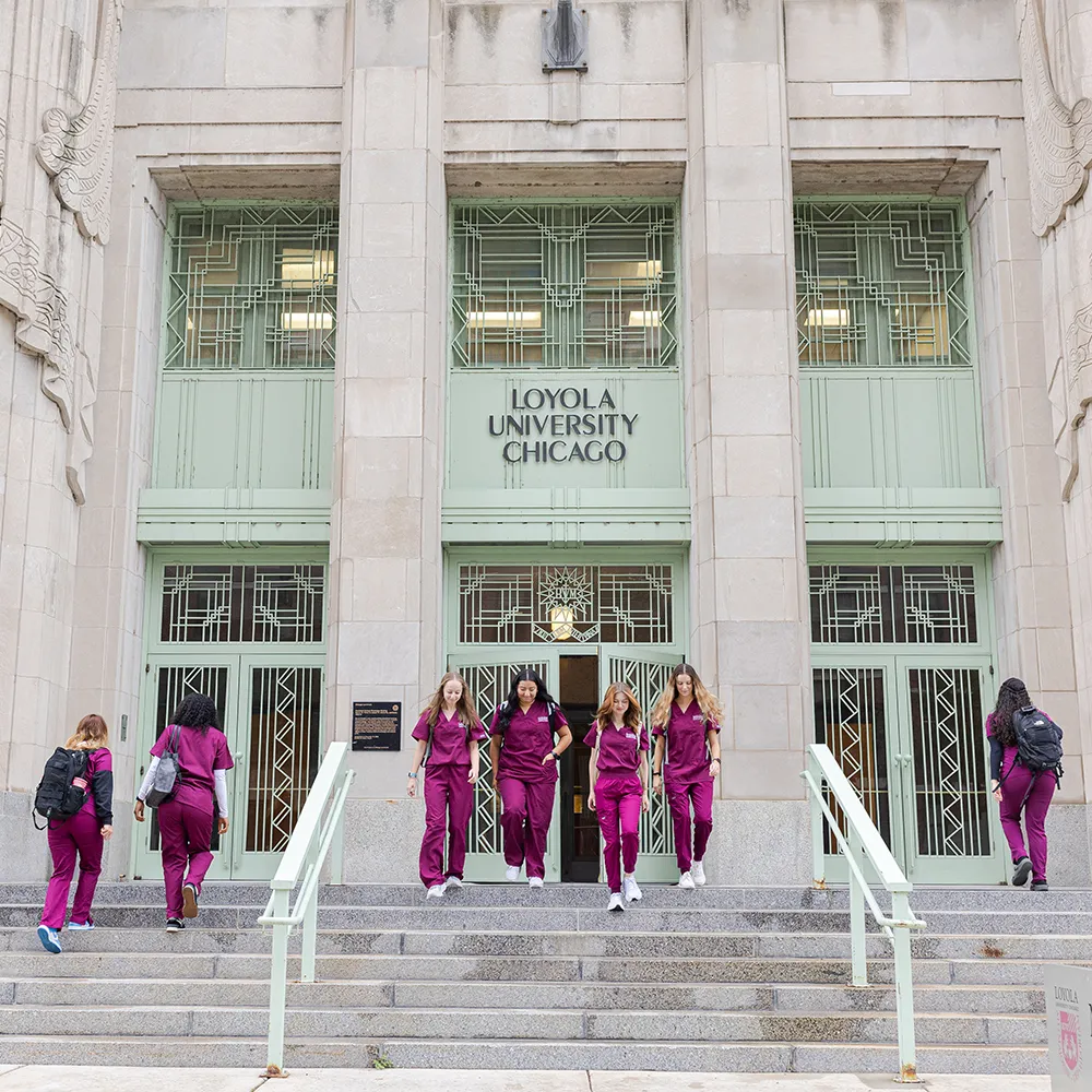 Nursing students on the steps of Mundelein Hall Nursing students on the steps of Mundelein Hall