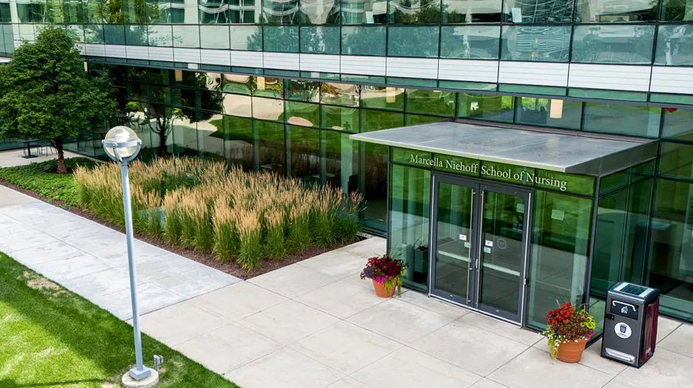 An aerial view of the Health Sciences campus in fornt of the Marcella School of Nursing entrance. An aerial view of the Health Sciences campus in fornt of the Marcella School of Nursing entrance.