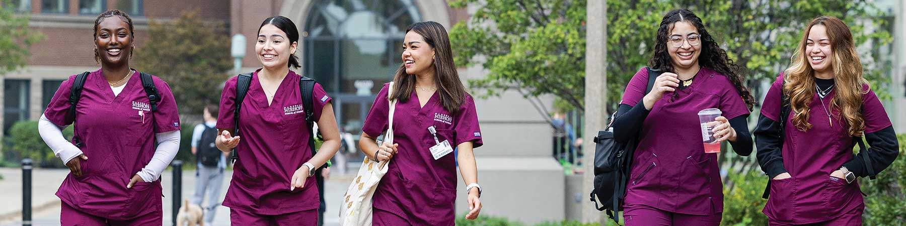 Loyola University Chicago nursing students walking through the HSC