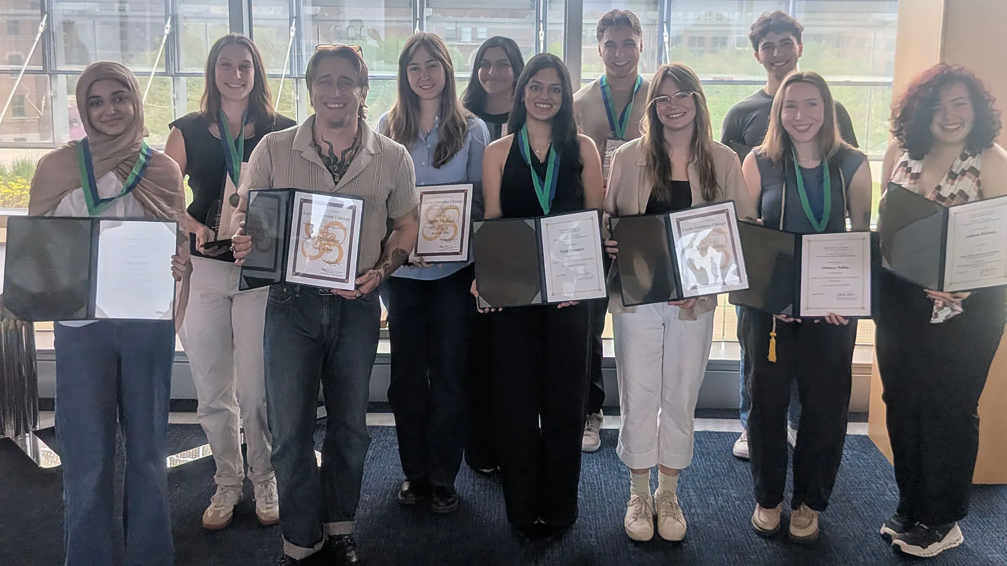 2026 Philosophy and Bioethics Undergraduate award winners pose with their certificates