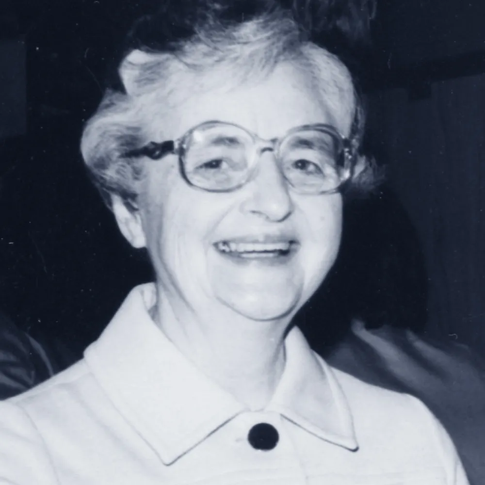 A black and white portrait of Sister Jean.