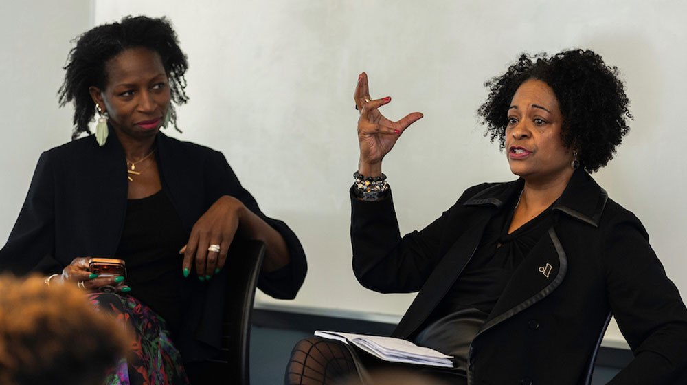 Kathleen St. Louis Caliento (The Revel Group) and Lisa Coleman (Adler University)