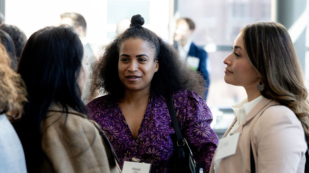 Woman talking together at a conference