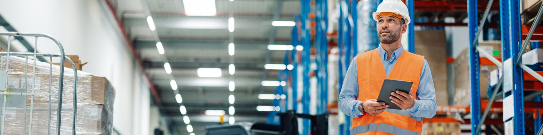 Warehouse worker using a tablet screen