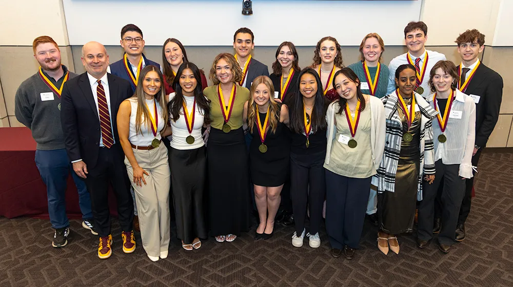 Business Honors Students take a group photo with their medallions