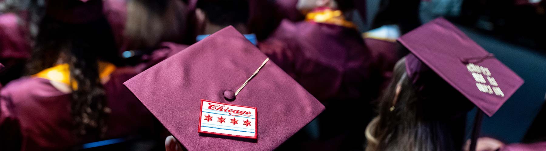 Chicago flag decorating the top of a graduating cap at a Quinlan Commencement Ceremony