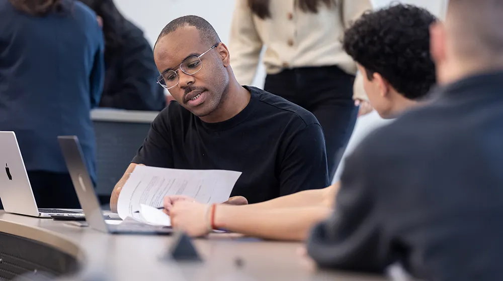 Students in Irem Sengal Orgut's class discuss an assignment.