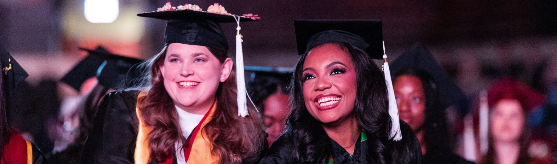 Loyola School of Continuing and Professional Studies graduates celebrate at Commencement ceremony.