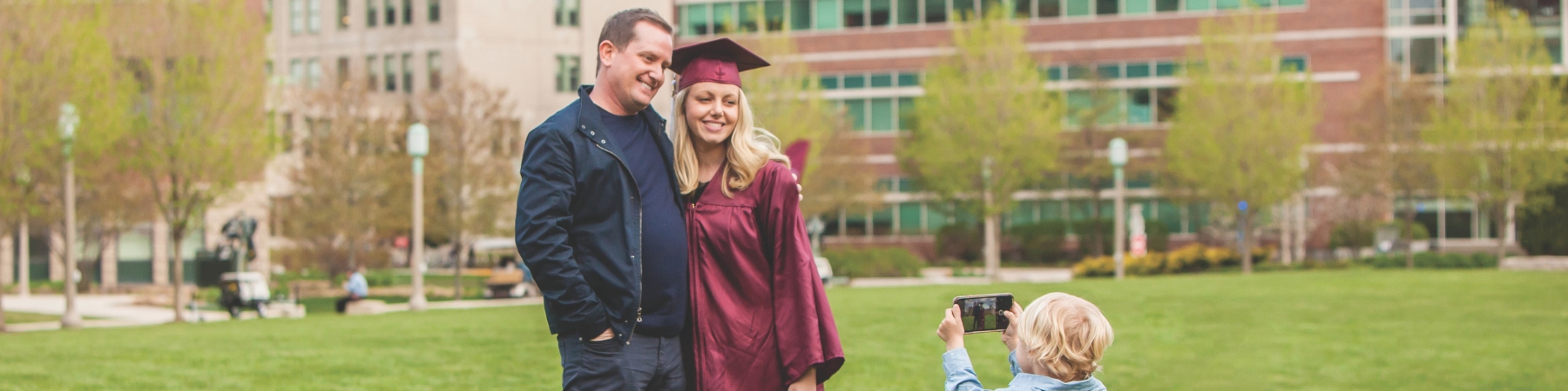 SCPS graduate celebrating with their family.