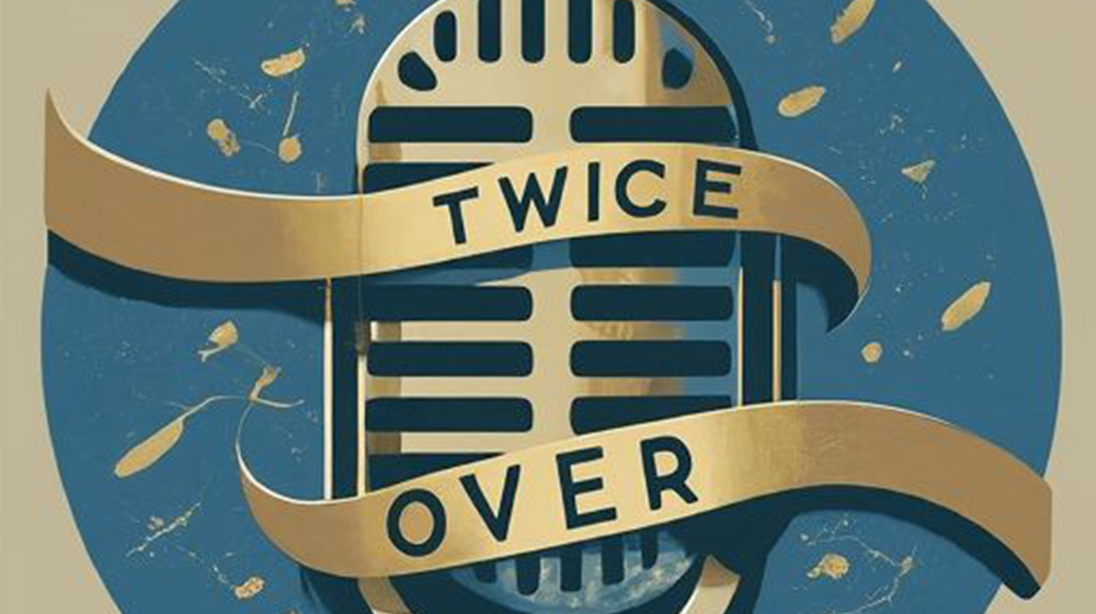 A stylized vintage microphone with gold ribbons displaying the words “Twice Over” sits centered against a textured blue background.