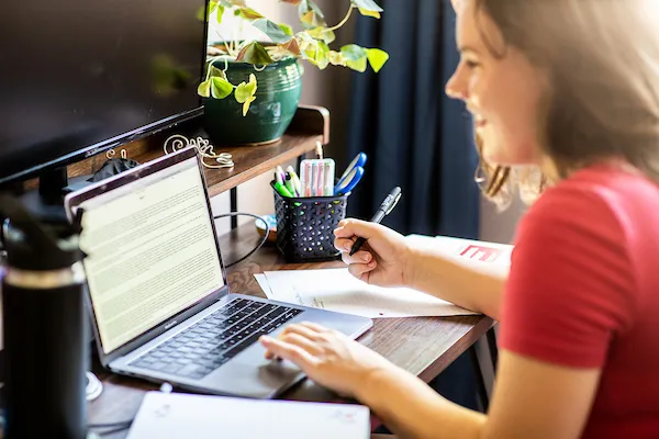 A student sitting at a computer