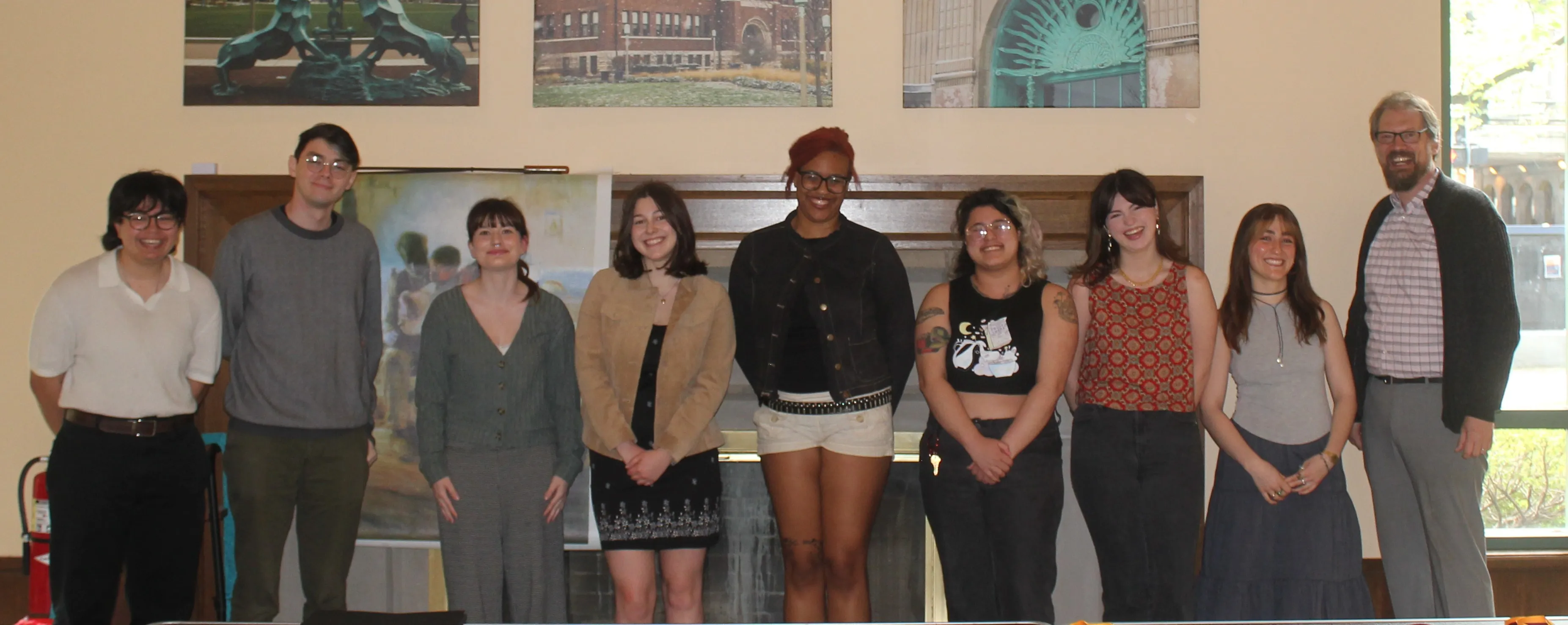 8 Undergraduate graduates with department chair at the end of the year celebration.