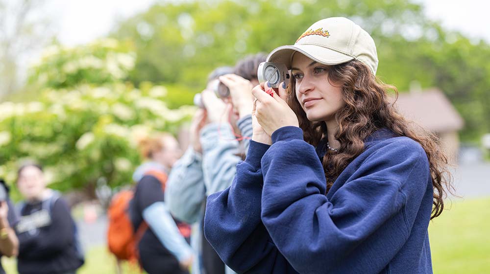 student taking measurements at LUREC