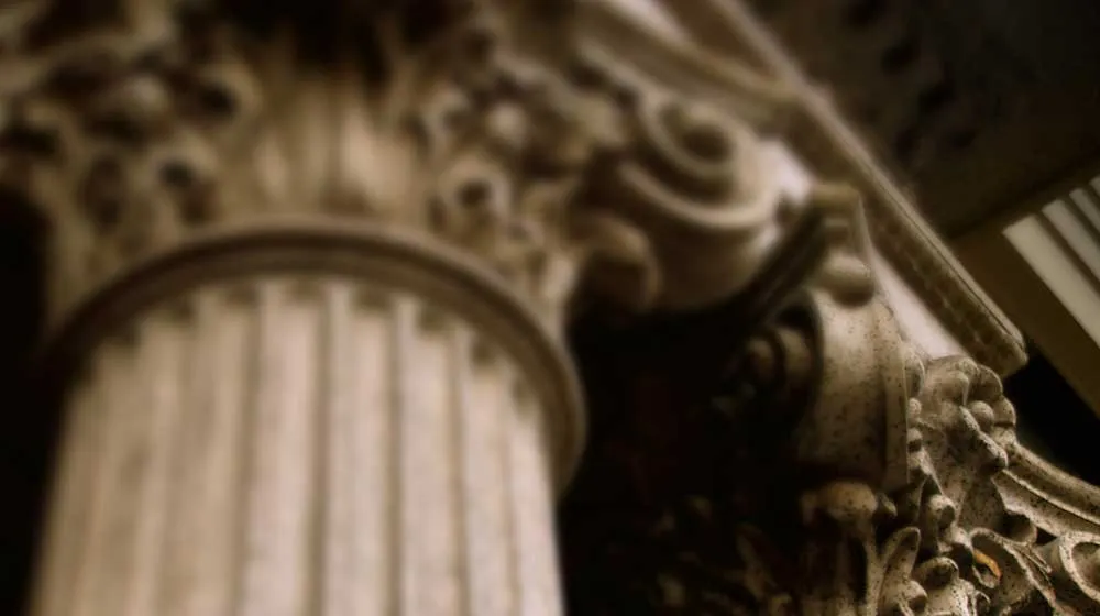 A close-up of of architectural column crown details A close-up of of architectural column crown details