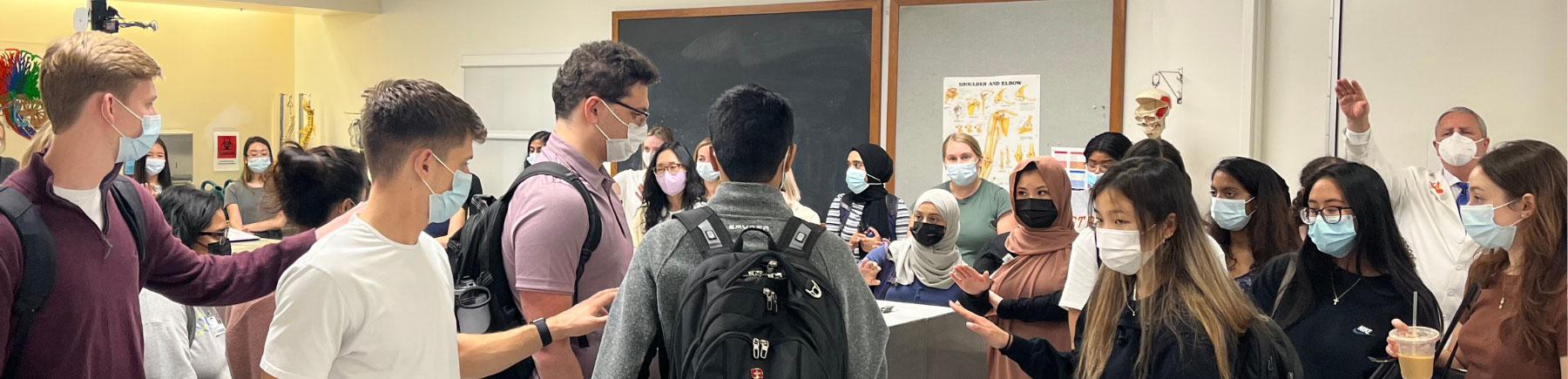 Loyola Stritch students blessing the donor bays in the Anatomy Lab.
