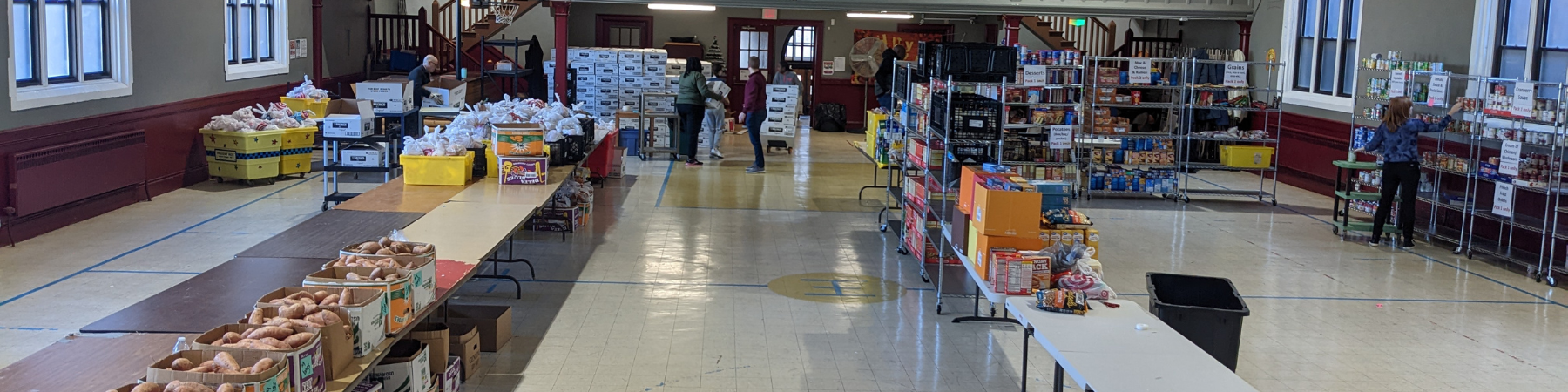 Loyola Chicago staff volunteering at the Quinn Center food box drive.