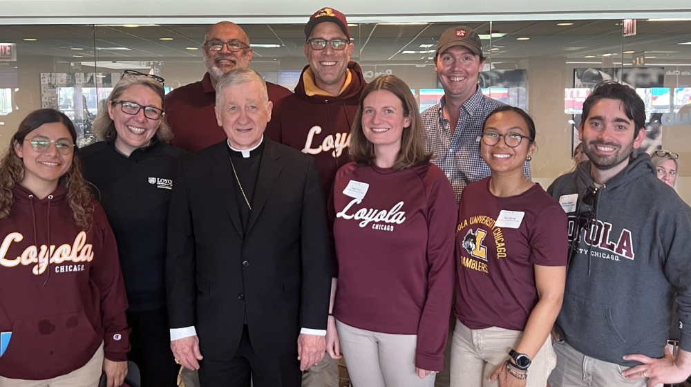 Loyola representatives joined thousands at the White Sox ballpark for a joyful and historic celebration of the first U.S.-born pope. 