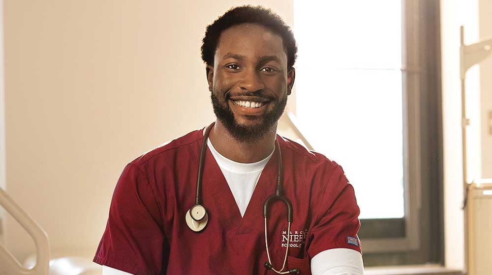Damilare Abdulsalam in nursing uniform