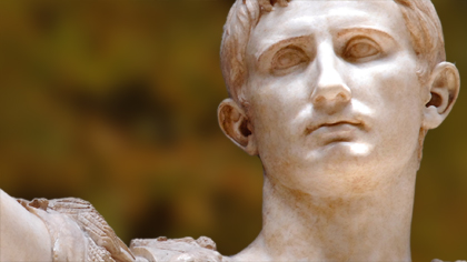 Close-up of a classical marble statue of a Roman figure.