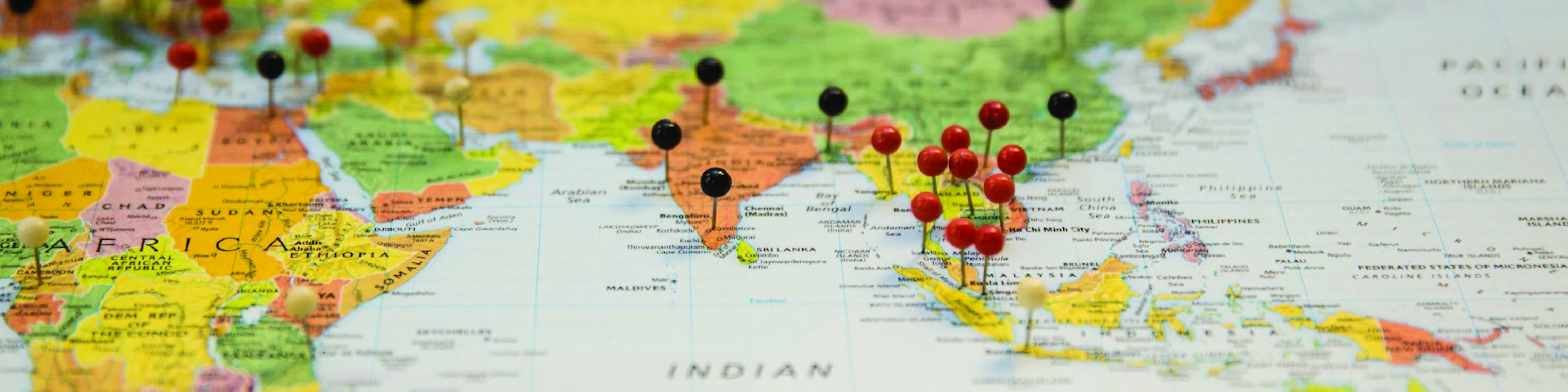 Map of the world with pins in locations